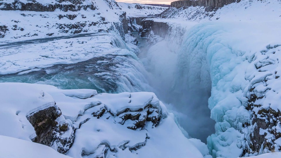 Snowy mountains and flowing water