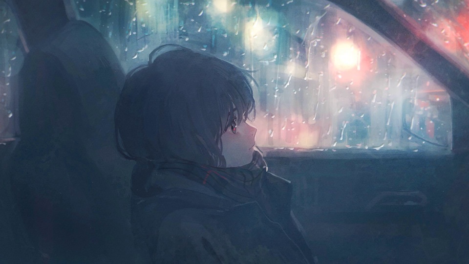 The girl in the car on a rainy day