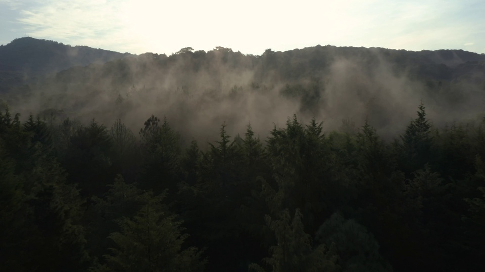 There is fog in the distant mountains