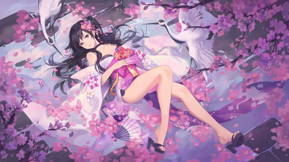 A beautiful woman in cherry blossoms