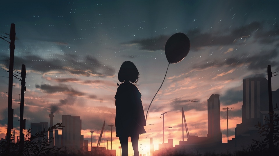 Balão menina no pôr do sol