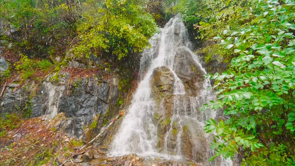 Snow mountain stream flowing water